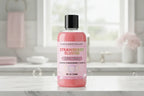 Pink bottle of strawberry slushie body wash with 'Pinksweetheart' branding on a white background